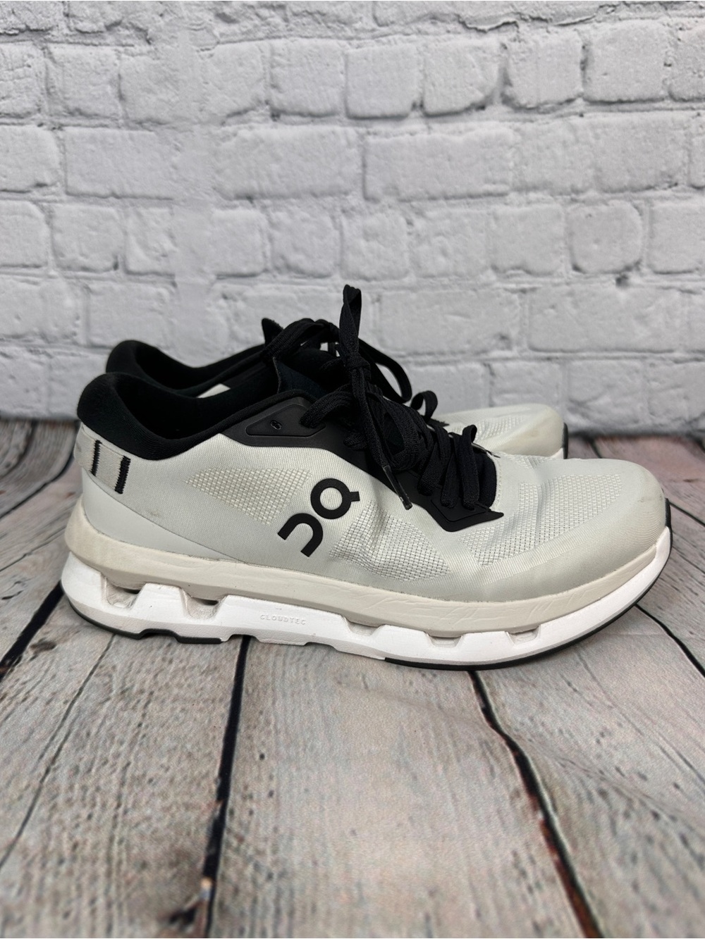 On Cloudzone sneaker in the Ice/Black colorway women’s size 7.5
